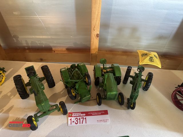 Lot 1-3171 - (4) Die cast tractors, including; (1) John Deere general purpose, (1) John Deere 70, and (2) John De...