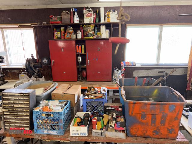 Lot 1-12126 - Contents of table, includes flashlights, nuts and bolts, small parts bin with assorted screws, sprin...