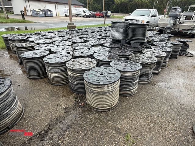Lot 1-18731 - Lot of (98) spools of 1" heavy duty rubber hose, 1" OD with 1/4" wall, approx. 5/8" center diameter,...