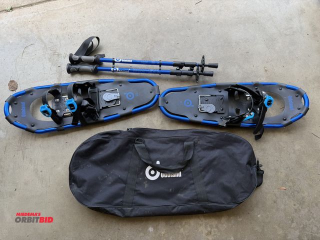 Lot 1-8388 - (1) pair of Odoland snow shoes with case and extendable walking sticks.