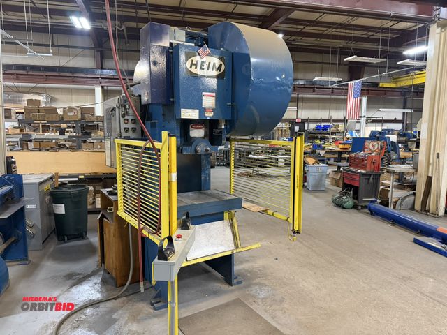 Lot 1-18508 - 1977 Heim 70-ton OBI Press  variable speed drive, safety curtains, palm button pedestal, winning bid...