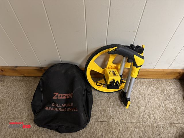 Lot 1-4592 - (1) Zozen collapsible measuring wheel.