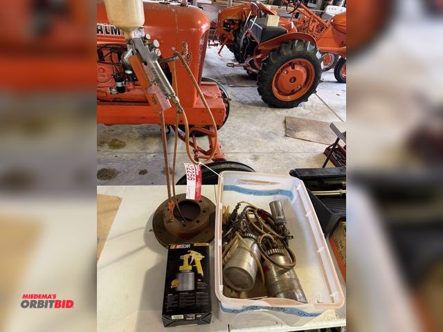 Lot 1-12256 - (1) spray gun stand with assorted spray guns, includes NASCAR general purpose spray gun, and more.