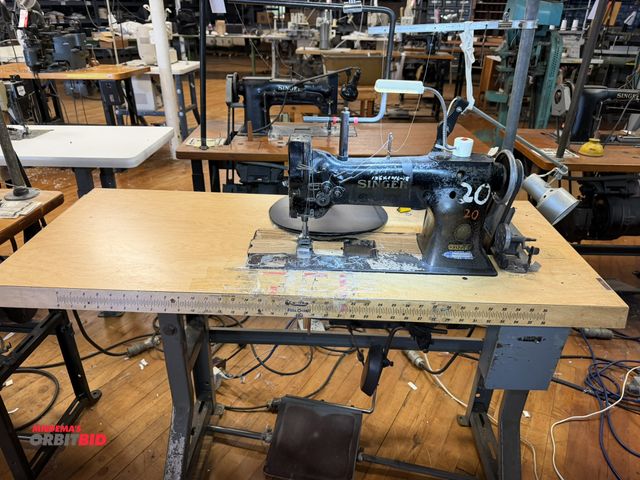 Lot 1-4680 - (1) Singer, model 112W140, commercial sewing machine with a power table, 1/2 HP, 3 phase motor, spoo...
