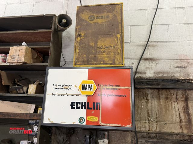 Lot 1-18591 - (1) NAPA 2-door, wall mount metal cabinet, 30.5" wide x 10" deep x 20" tall, includes contents of as...