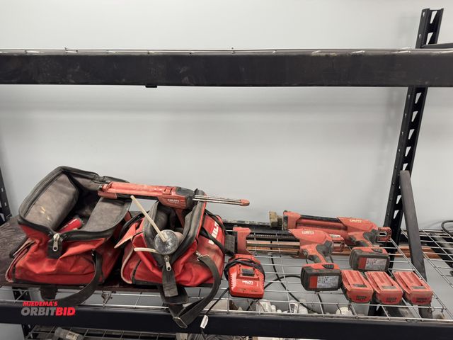 Lot 1-18680 - Lot of (2) Hilti HDE500-A22, cordless caulk guns, includes (5) batteries, (1) battery charger, and (...