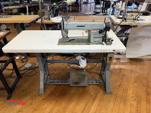 Lot 1-4677 - (1) Juki, model DDL-5550-6, commercial sewing machine on power table with easy clutch 1/2 HP, 3 phas...