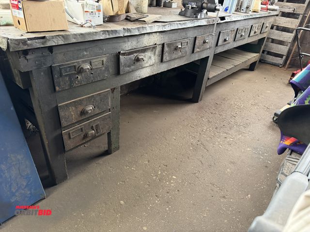 Lot 1-1227 - (1) 145" length x 37" height x 32" depth heavy duty wood framed work bench with 10 drawers, contents...
