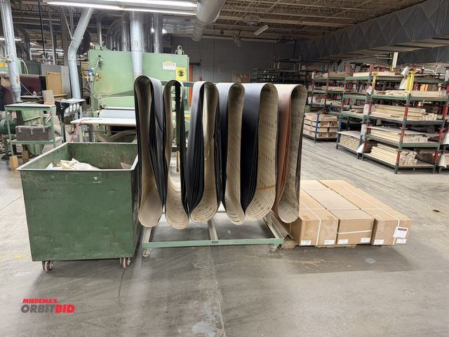 Lot 1-16524 - (1) Baker Metal Products rolling belt rack, approx. 56" x 45.5", with assorted sanding belts, also i...