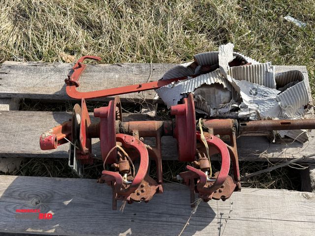 Lot 1-11821 - (1) skid with assorted pulley components and other hardware for a hay baler.