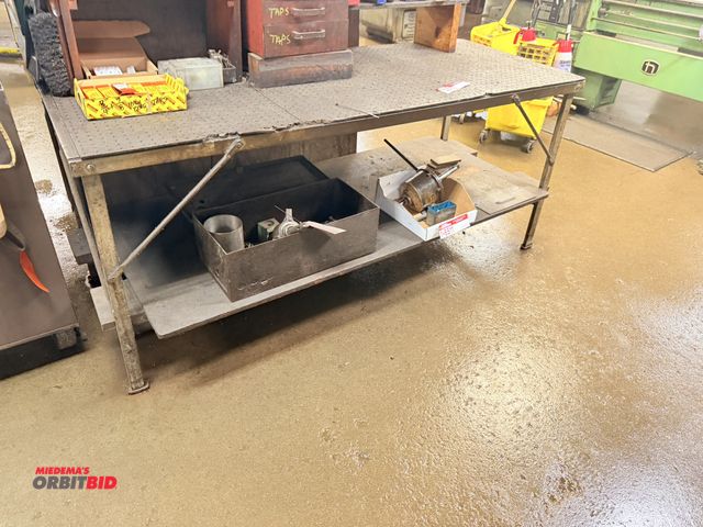 Lot 1-6514 - (1) steel shop table, 71" x approx. 28" deep x 31" tall, with pegboard style wood top.