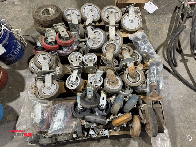 Lot 1-1518 - Large lot of assorted casters, and (2) size 10/3.50-4 utility tires with center rims.