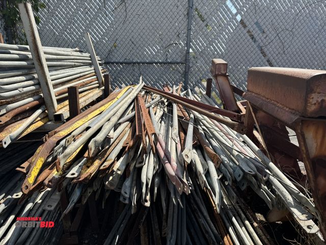 Lot 1-2650 - Large lot of scaffolding cross braces, 88" length, winning bidder responsible for proper removal.  (...