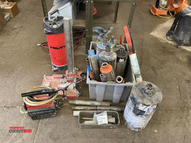 Lot 1-6192 - Lot of assorted Hilti Core Drill / Hilti parts, includes DD110RA core drill stand, (1) water sprayer...