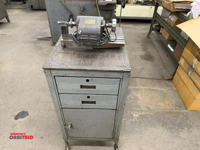 Lot 1-1765 - (1) DoAll tool post grinder, 115V, includes rolling, 2-door cabinet.