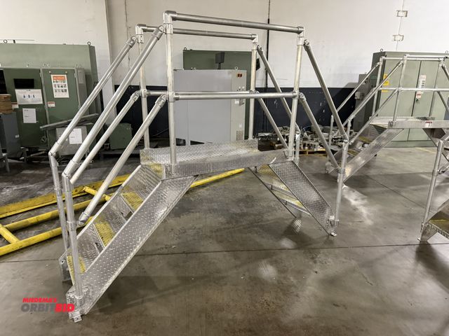 Lot 1-5484 - (1) 102" long stainless steel 2-sided, 3-step platform, platform floor at 34.5" tall, guardrail at 4...