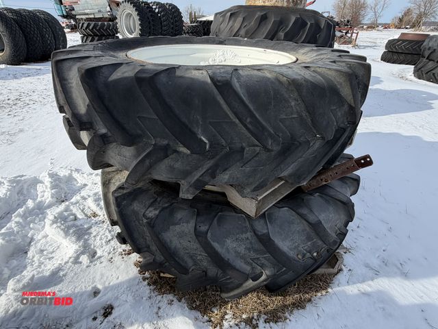 Lot 1-11627 - Lot of (2) Michelin Agribib 18.4R34 tires on 8-bolt rims, tires are used and weather checked.