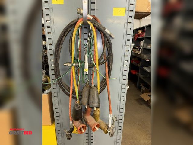 Lot 1-6404 - Lot of (4) high voltage grounding out cables, and (2) hydraulic hoses.