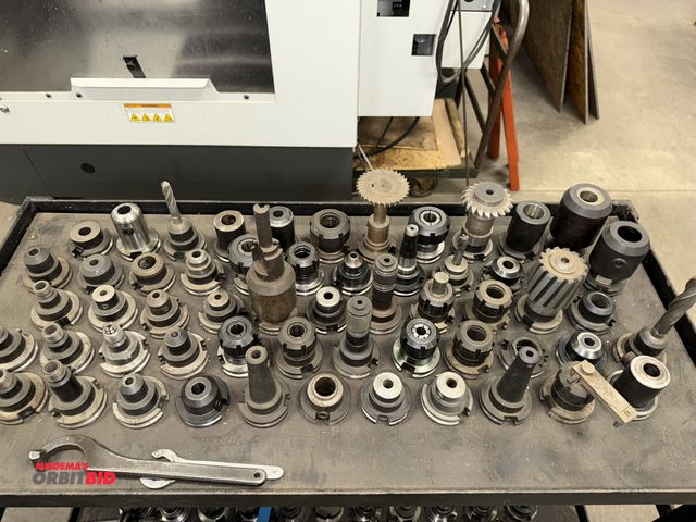 Lot 1-1961 - Lot of approx. (57) Cat 40 type tool holders, some with cutting tools, collets, end mills, and shrin...