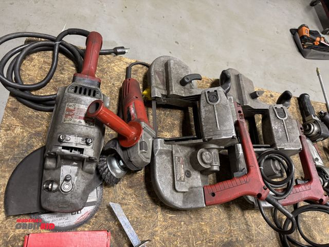 Lot 1-19566 - Lot including (2) Milwaukee hand held heavy duty band saws, (1) Milwaukee Cat #6147-30, 11,000 RPM, ...