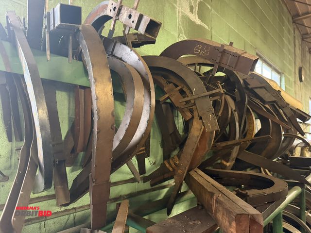 Lot 1-18775 - Lot of custom-fabricated formed steel arches, winning bidder responsible for proper disassembly and ...