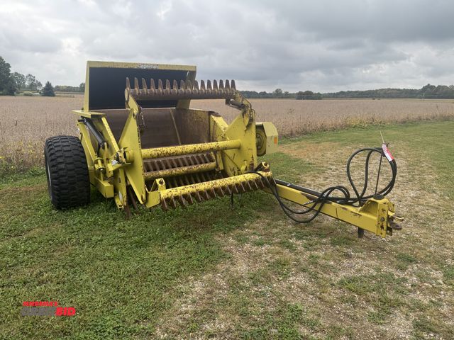 Lot 1-19957 - (1) Degelman rock picker, model RP6000, hydraulic dump, 16.5L-16 tires, approx. 53.5" wide pick up t...