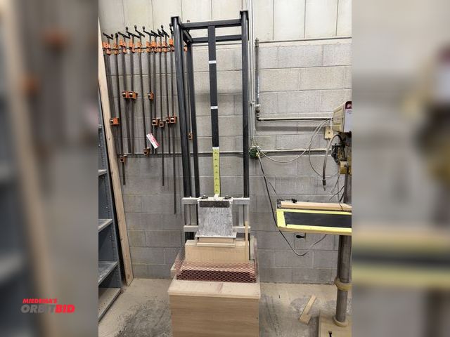 Lot 1-16585 - (1) custom built paper strength tester, manual, 25" x 32" base x approx. 96" tall, winning bidder re...