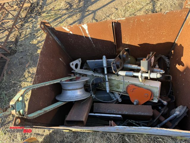 Lot 1-2916 - (1) metal bin filled with assorted 1-ton beam trolleys, 10" block sheath, and other assorted scrap a...