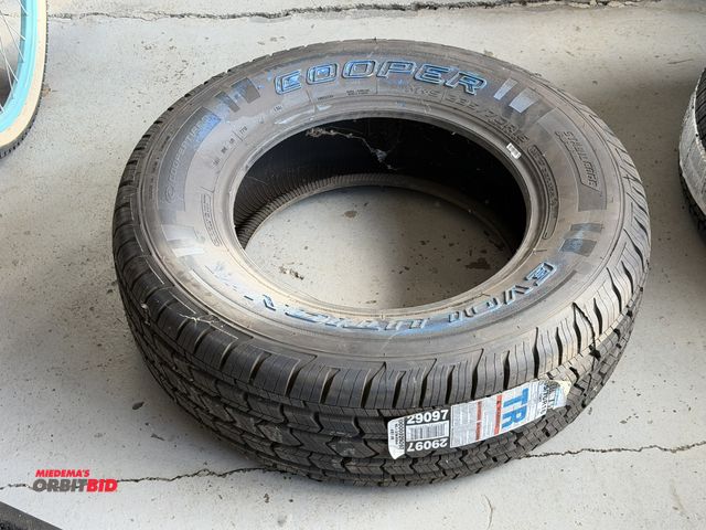 Lot 1-1296 - (1) new Cooper Evolution HT, size 235/70R16 tire.