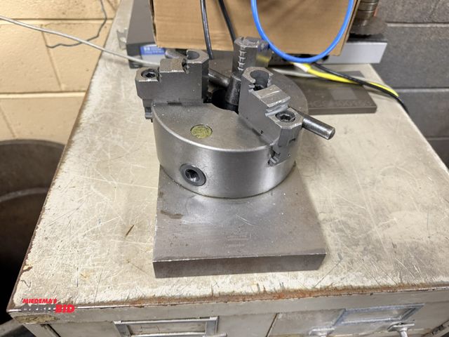 Lot 1-12421 - (1) 6", 3-jaw chuck with attached 11 1/4" x 6" x 1 1/4" steel block.