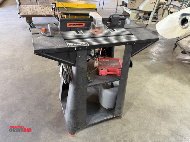 Lot 1-102543 - (1) Magna router table with Ryobi 1-1/2HP router