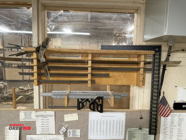 Lot 1-16396 - (1) custom made ruler rack with (1) 48", (1) 36", (1) 24", and (1) 18" ruler, (2) 12" adjustable squ...