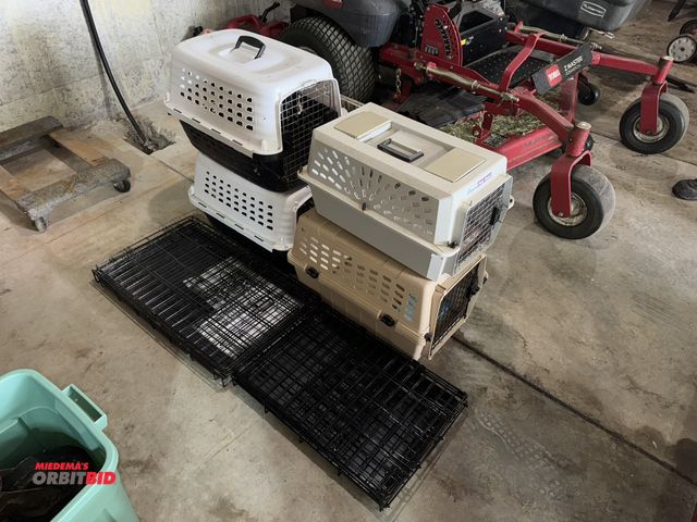Lot 1-621 - Large lot of assorted animal cages, includes (4) Pet Master Pet Taxis, (1) medium dog cage, (1) smal...
