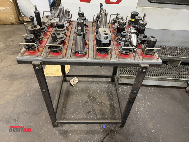 Lot 1-11098 - (1) 37.5" width x 35" height x 25" depth steel framed tool rack with interchangeable plastic tool ho...