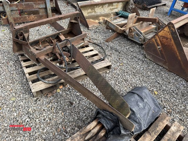 Lot 1-16029 - (1) custom built specialty fork attachment for skid steer with 47" wide carriage and 52" long x 6.5"...