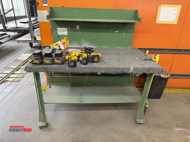 Lot 1-17479 - (1) steel framed table with wood top and backsplash, 60" x 34", does not include contents, table onl...