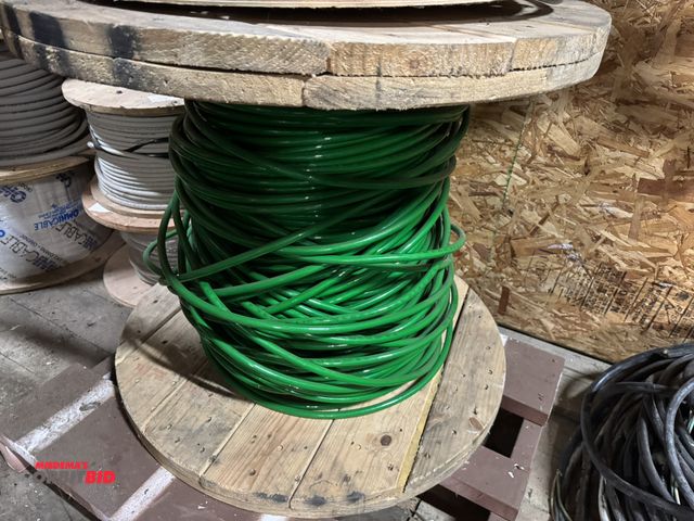 Lot 1-4304 - (1) partial spool of Priority Wire, 1/0 AWG aluminum A88000 compact strand PVC, 600V green, approx. ...