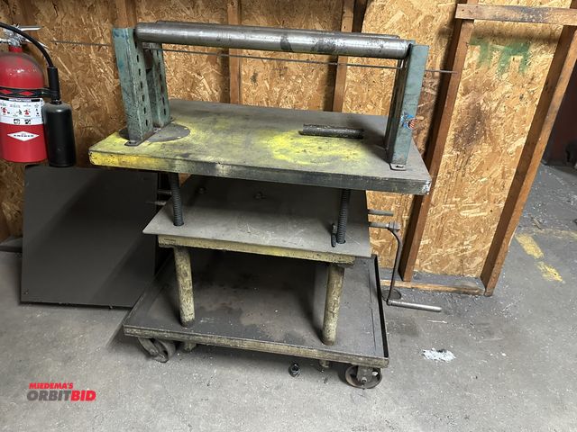 Lot 1-14431 - (1) Approx. 36" length x 24" depth rolling lift table with custom built steel roller mounted to top