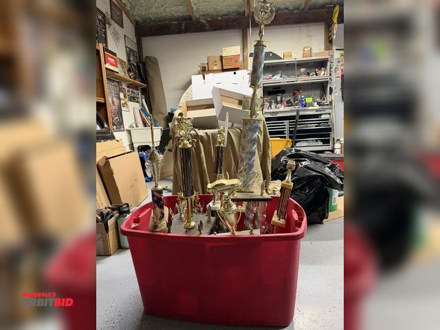 Lot 1-8292 - (1) tote of assorted trophies, includes various custom motorcycles show trophies, car show trophies,...