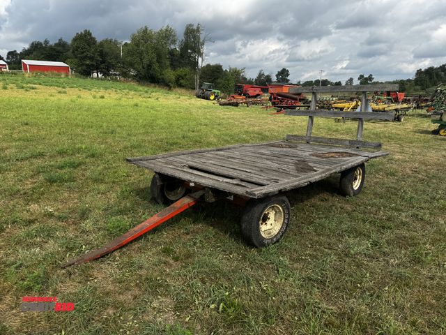Lot 1-19726 - (1) 14' long x 8' wide wood deck hay wagon with running gear, Kory Farm Equipment Division, model 66...