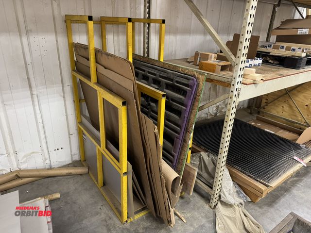 Lot 1-19551 - (1) metal storage rack, 44" x 29" x approx. 66", includes plywood, and cardboard (3 slot).