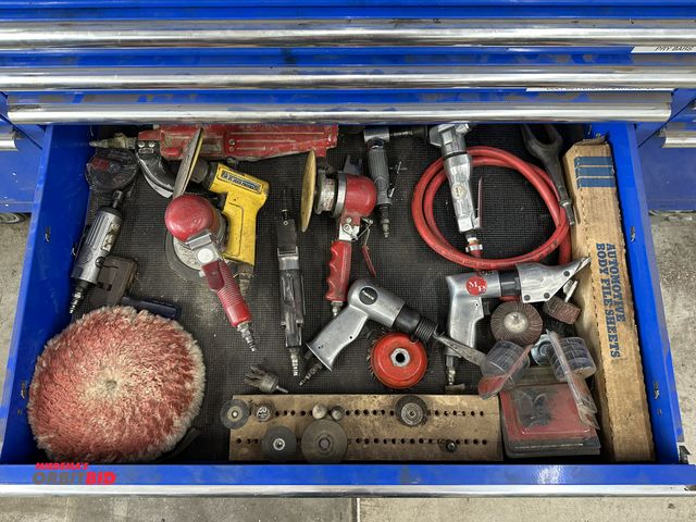 Lot 1-534 - Large lot of assorted pneumatic tooling, includes shears, sanders, hack saw, grinding wheels, and mo...