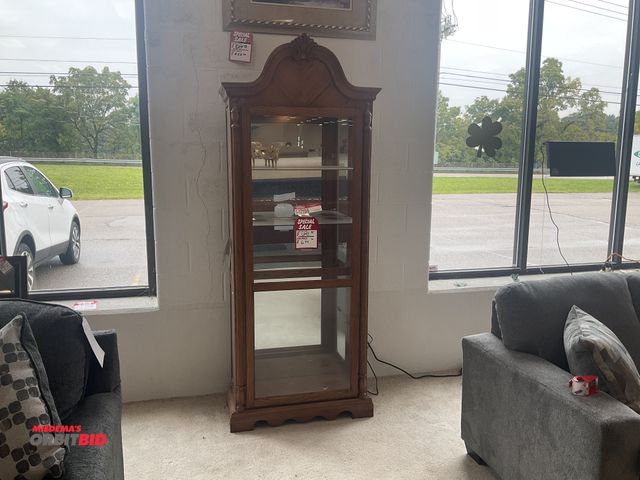 Lot 1-17156 - Ashley Accents curio cabinet. 30 1/2” wide by 84 1/2” tall by 15” deep