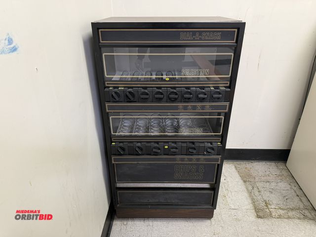 Lot 1-15501 - (1) Dial-A-Snack vending machine, 14-selection, 28" x 19.5" deep x 54" tall, includes keys.