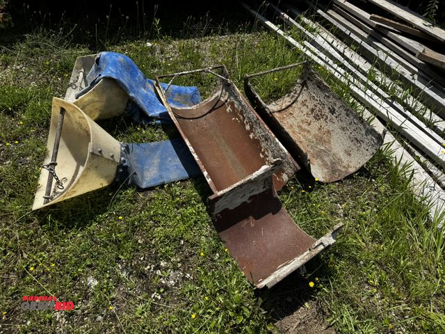Lot 1-14278 - Lot of (2) 8" concrete elephant trunks/chutes, and (3) partial chute pieces, each measures 18" x 34"...