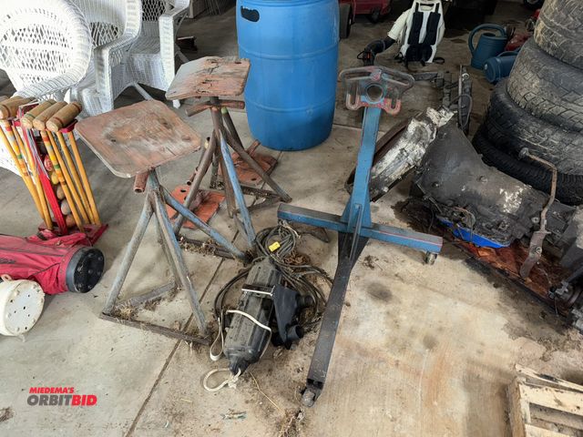 Lot 1-628 - Lot of (2) adjustable boat stands, platform height of 24", includes (2) extra pads, (1) rolling engi...