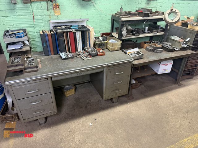 Lot 1-18610 - (1) 60" width x 30" height x 30" depth Invincible brand vintage steel desk with 7 drawers, and slide...