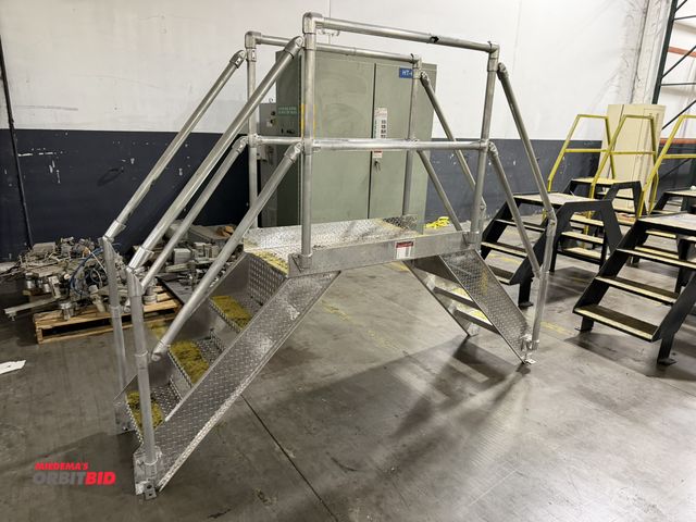 Lot 1-5485 - (1) 102" long stainless steel 2-sided, 3-step platform, platform floor at 34.5" tall, guardrail at 4...
