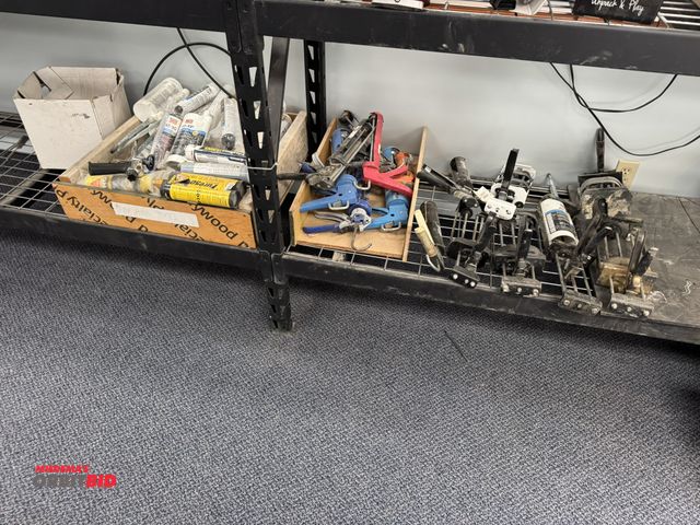 Lot 1-18684 - Large lot of assorted manual caulk guns, includes DeWalt adhesive cartridge dispensers, Simpson caul...