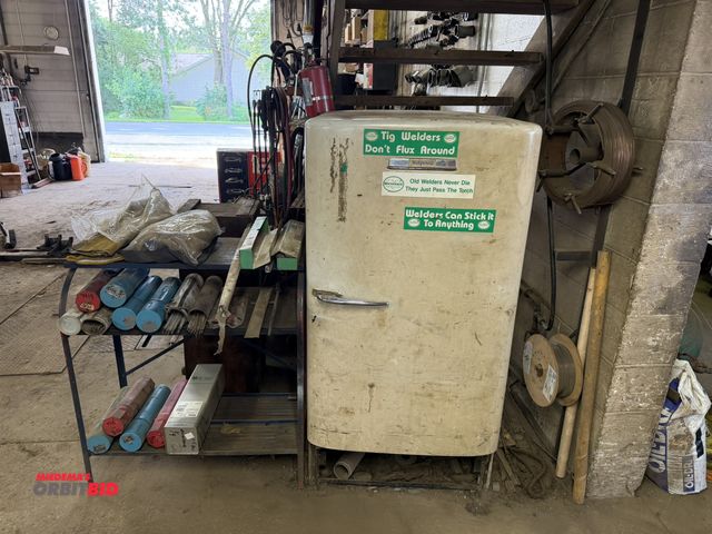 Lot 1-18584 - Large lot of assorted welding rod, various types, includes Hotpoint vintage refrigerator, used for s...